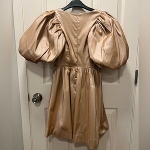 Peplum dress by Aureta. Size XSmall. Champagne/Rose gold color.
